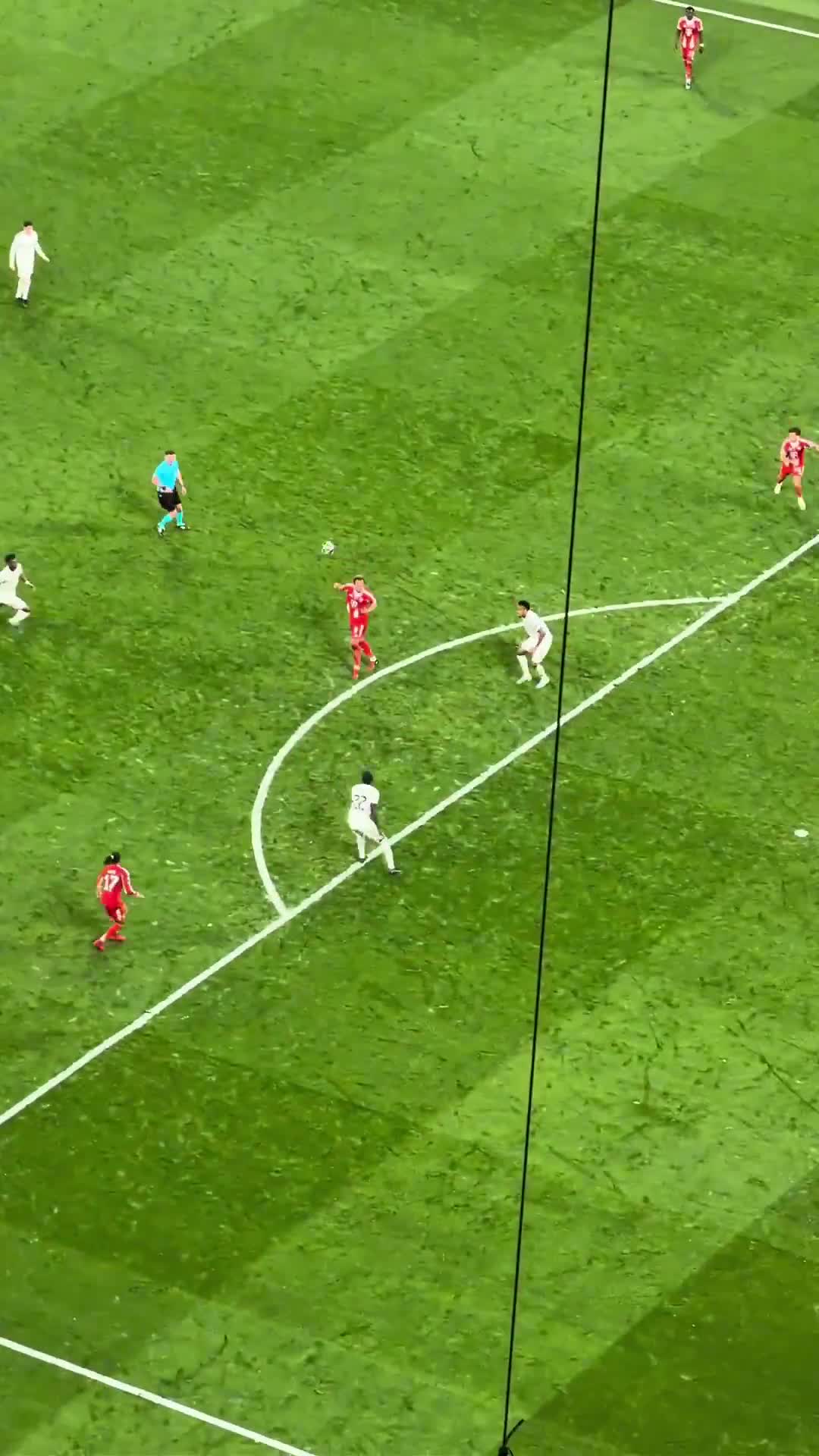 Michael Olise getting pushed down in the box against Real Madrid (stands angle)