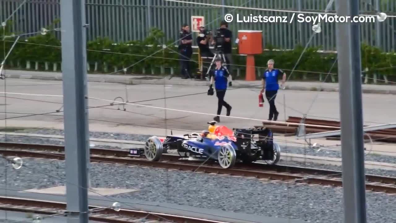 Formula 1 car rolling on train tracks in Madrid