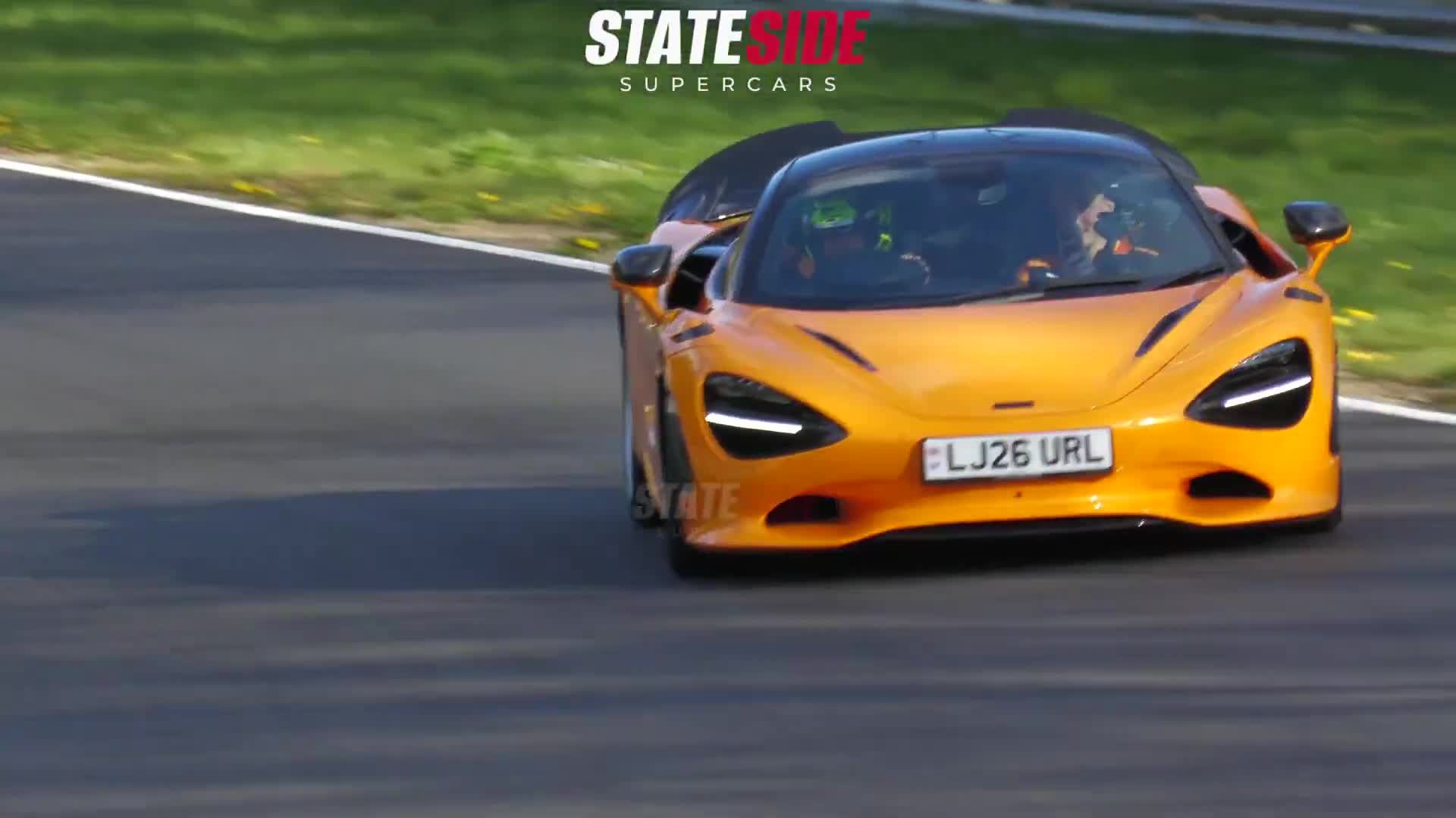 lando driving mclaren 750s around the nurburgring
