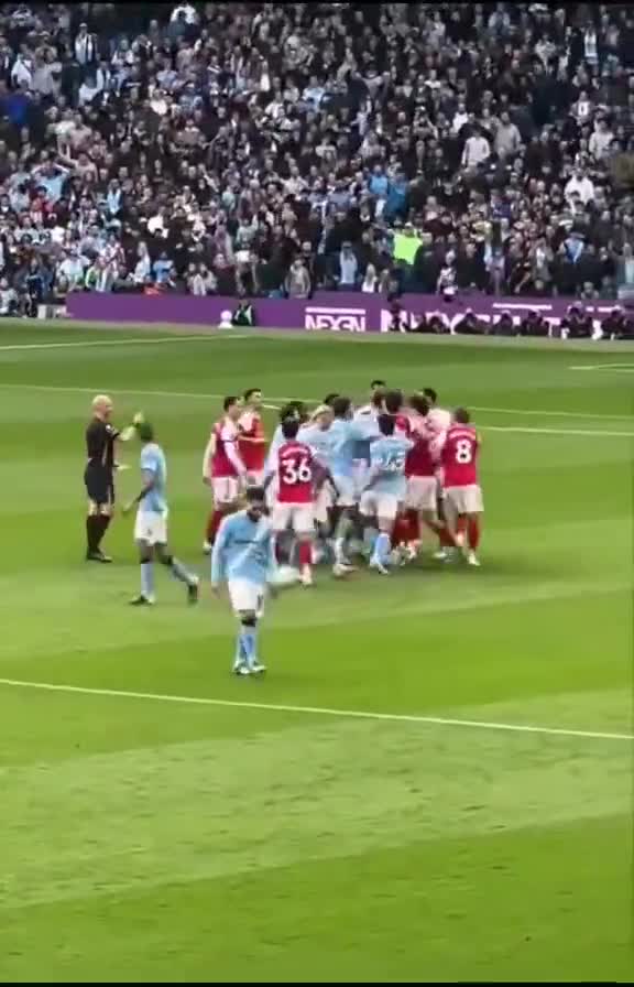 Cherki casually doing kick ups as the City and Arsenal players went at each other