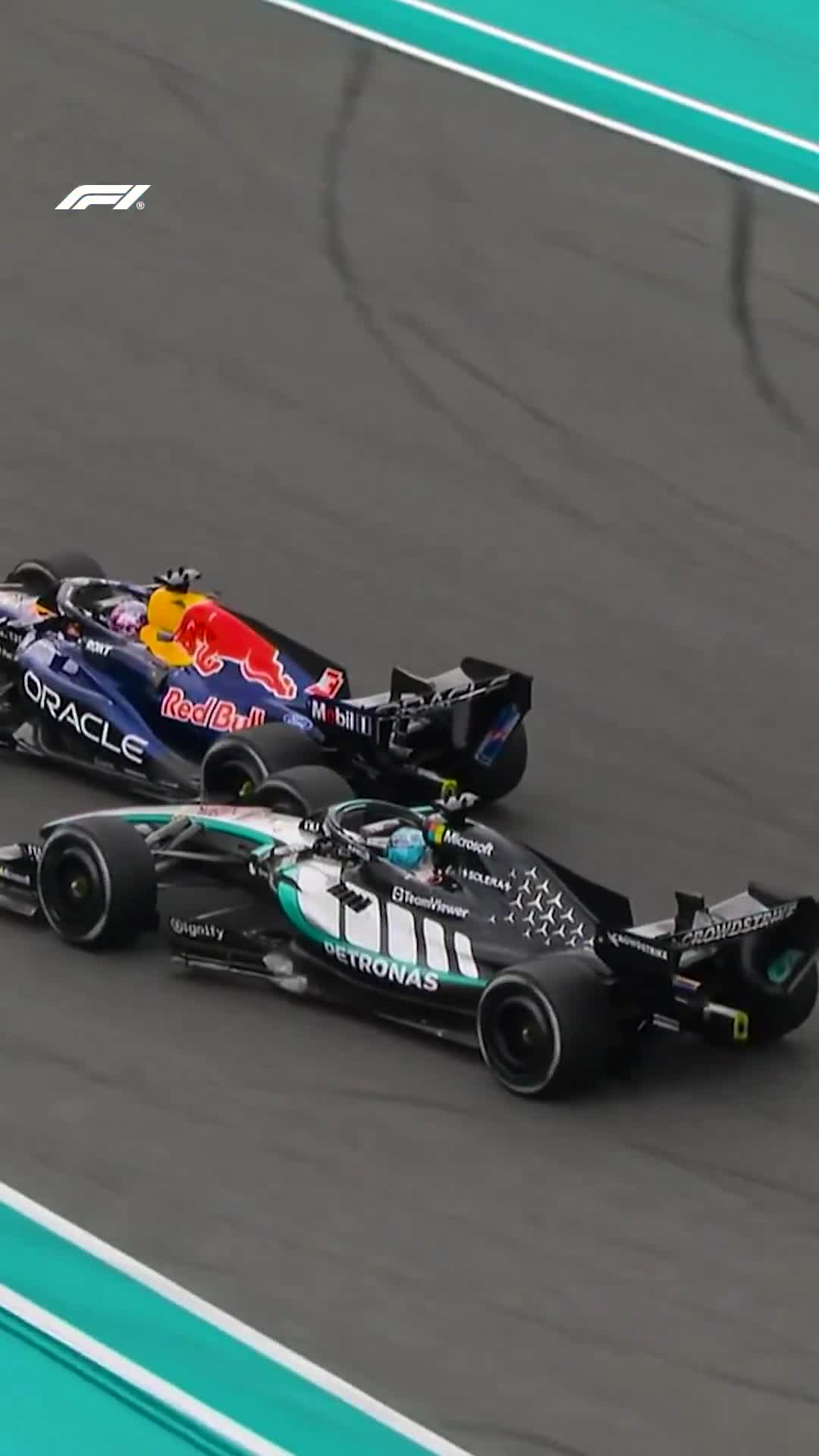 Sparks fly on Russell's Mercedes following the lightest of touches with Verstappen