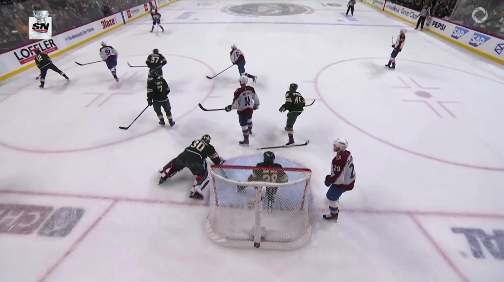 Jesper Wallstedt drops to the ice in EXHAUSTION after shutting the door on a FLURRY of shots from the Avs in the final minute of play