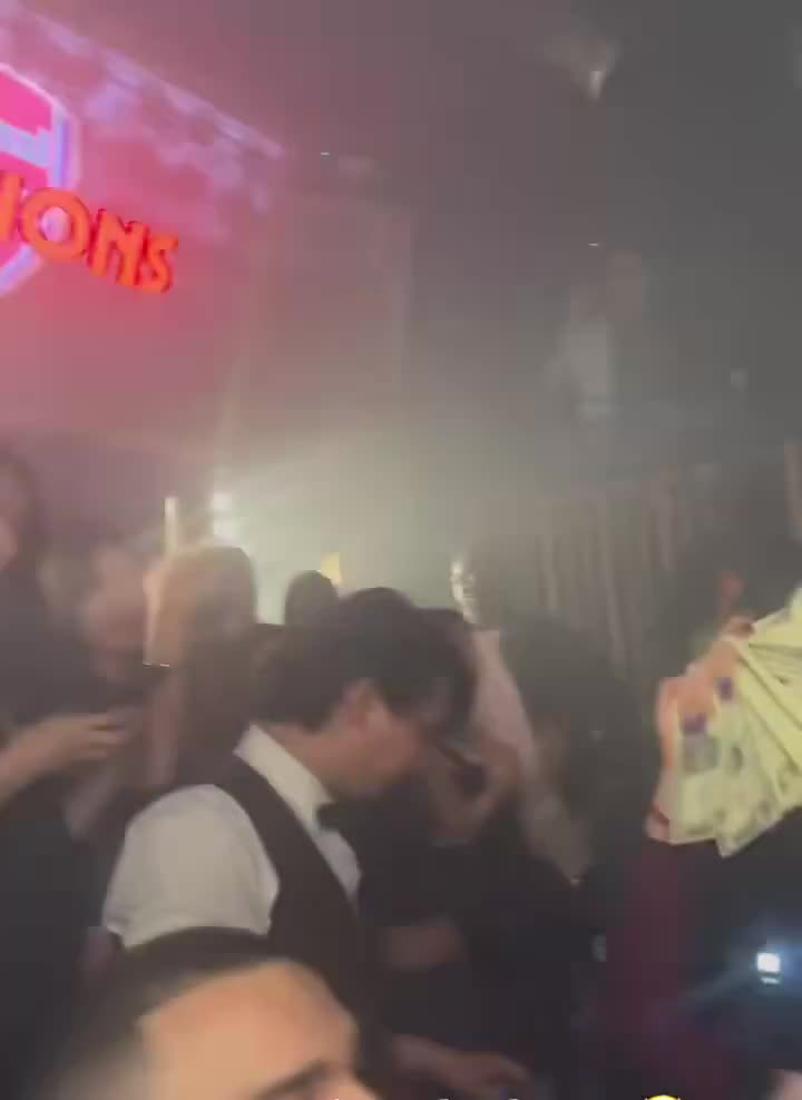 Arsenal players celebrating winning the Premier League at Soho nightclub, Tape London.