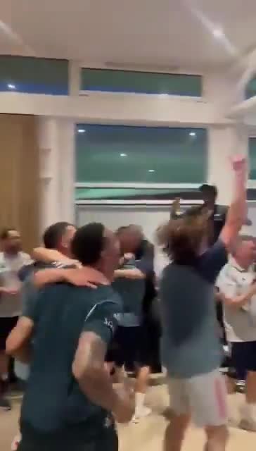Declan Rice picking up Andrea Berta while the players dance to THAT infamous TikTok song.