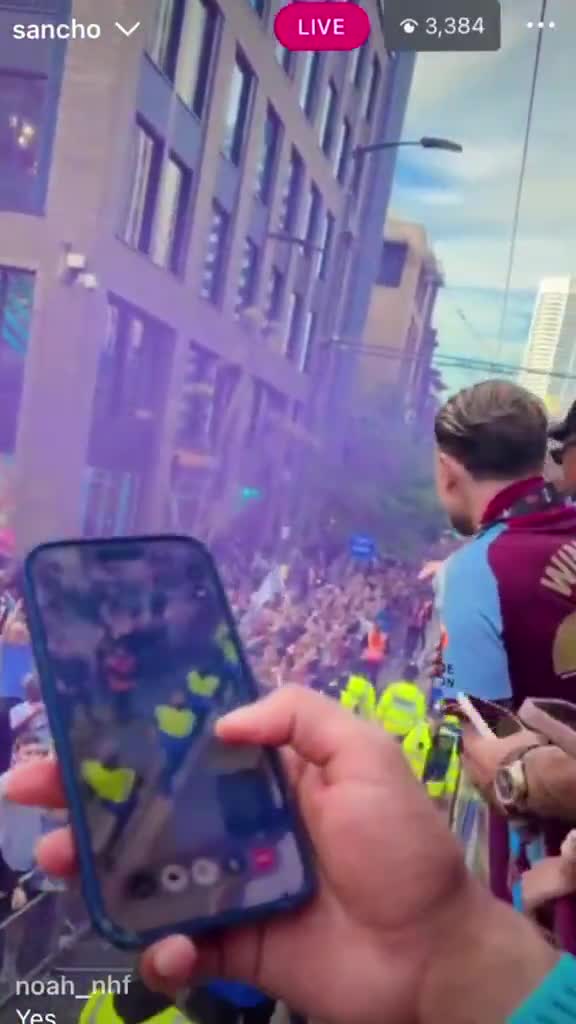 Bukayo Saka on FaceTime with England teammate, Ezri Konsa, during the trophy parade after Aston Villa won the Europa League.