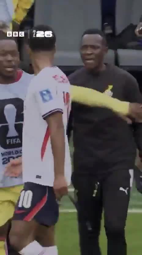 Jude Bellingham exchanges words with Ghana's coaching staff after the final whistle