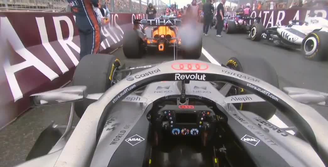 Max Verstappen takes a closer look at Oscar's McLaren