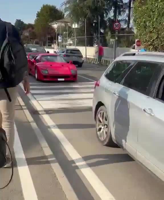Lewis Hamilton driving his F40 in Maranello, with his iconic number 44 on it