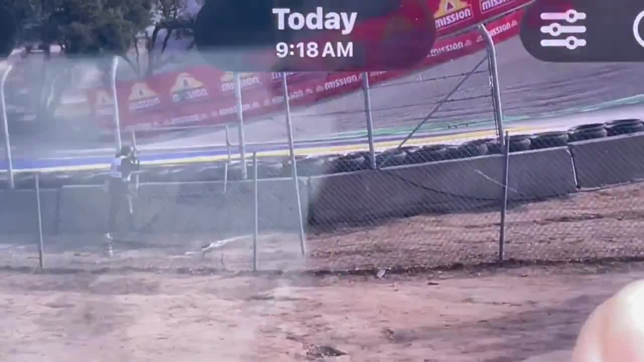Big Porsche crash at Zanardi Corkscrew before Indycar FP2. Driver ok. FP2 delayed.