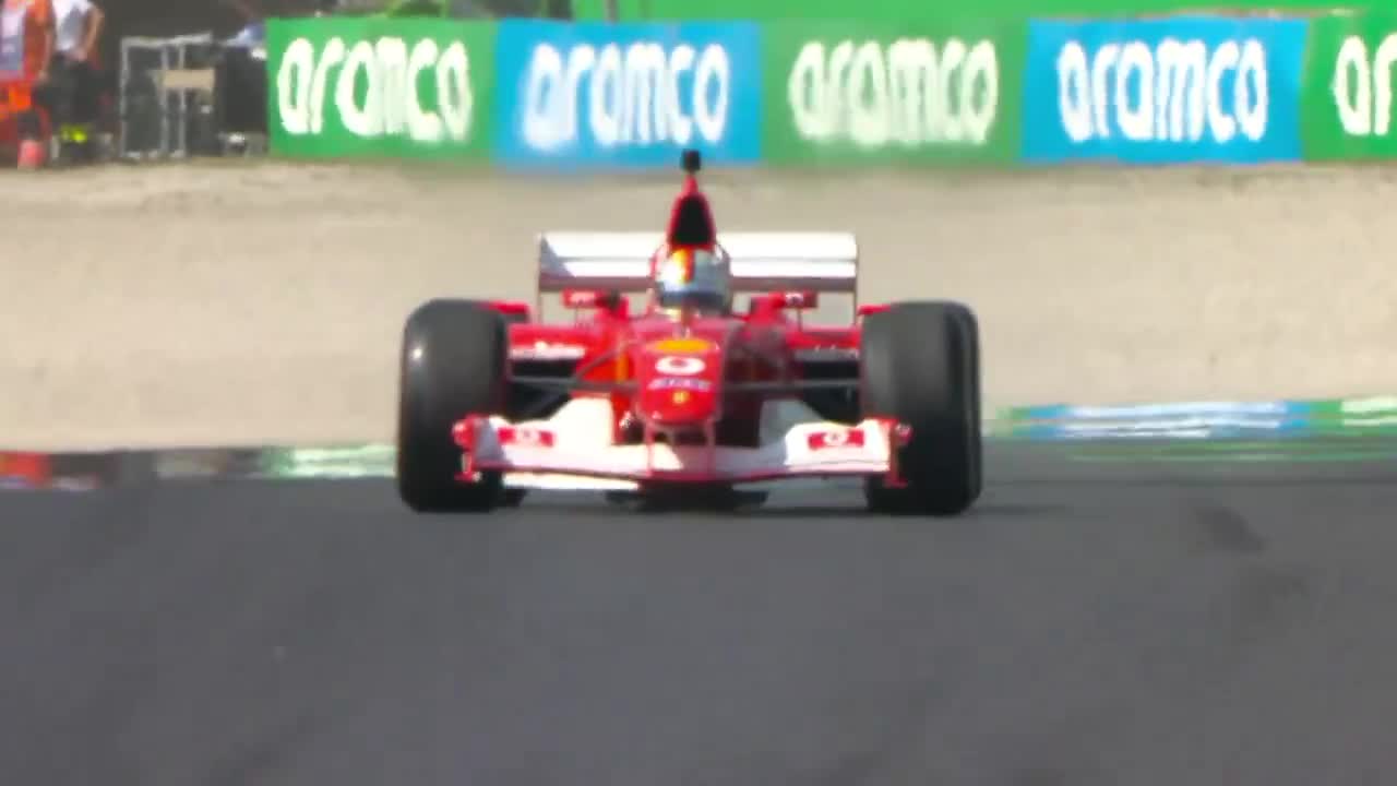 Sebastian Vettel drives Michael Schumacher’s F2002 at Monza, including a few donuts.