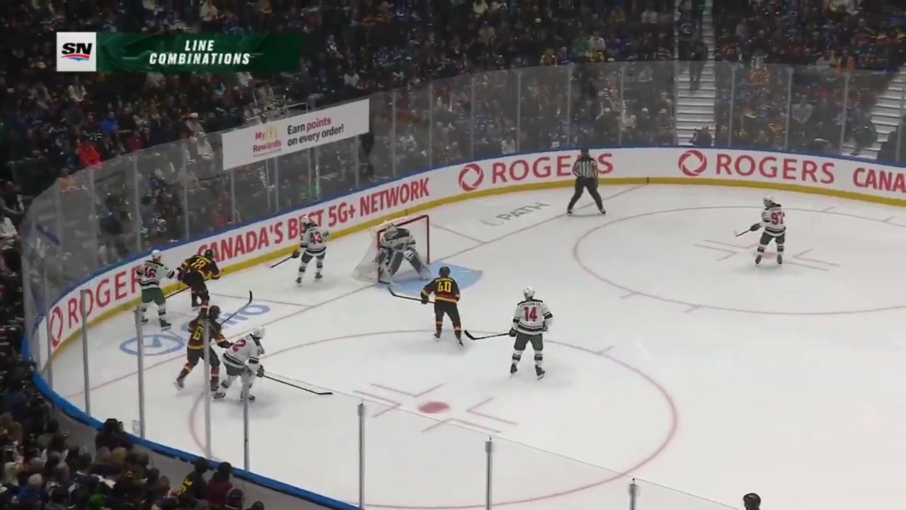 Canucks fans with some HUGE CHEERS for this hit on Quinn Hughes