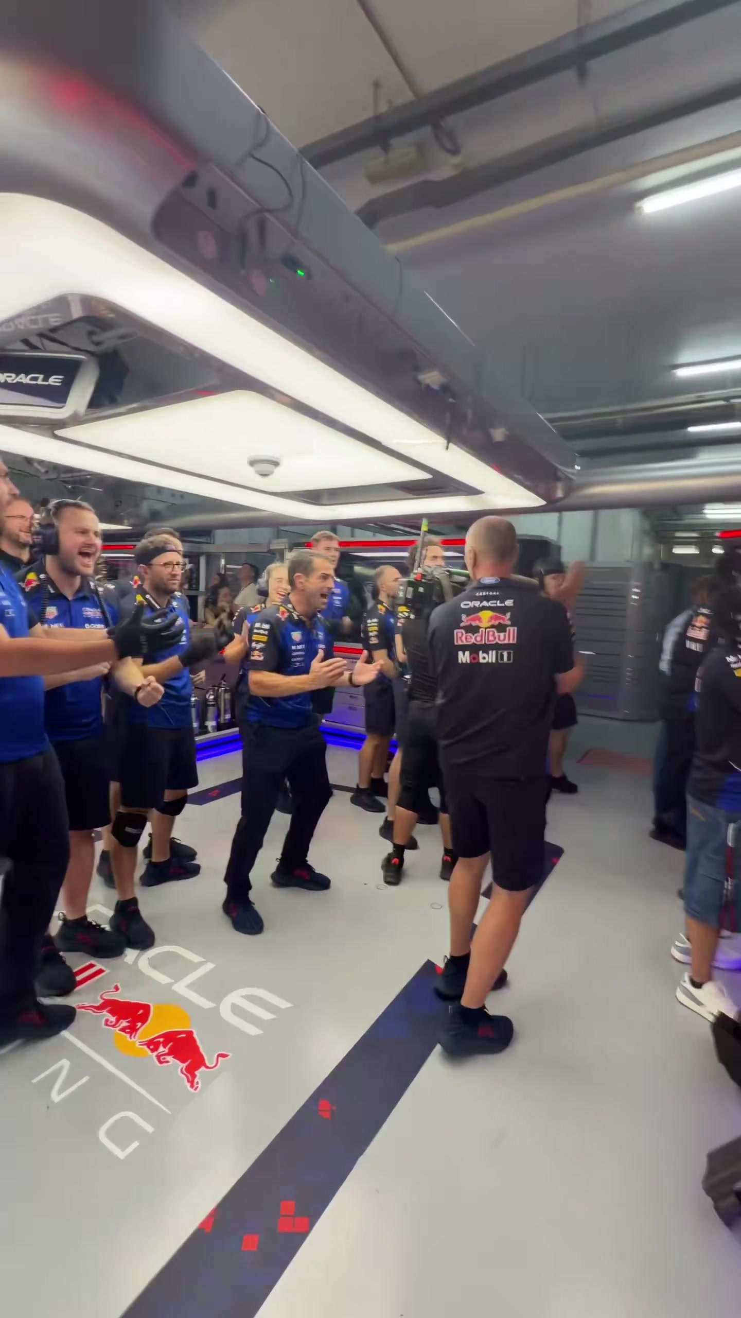 The Red Bull team celebrates Max Verstappen’s first pole of the season