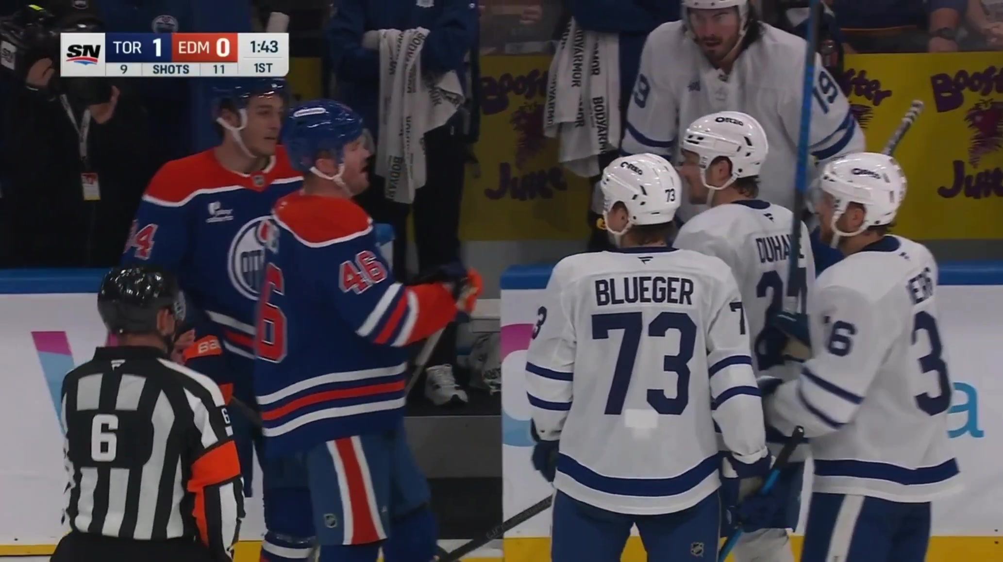 The Oilers' and Leafs' 4th lines were getting into it in front of the benches