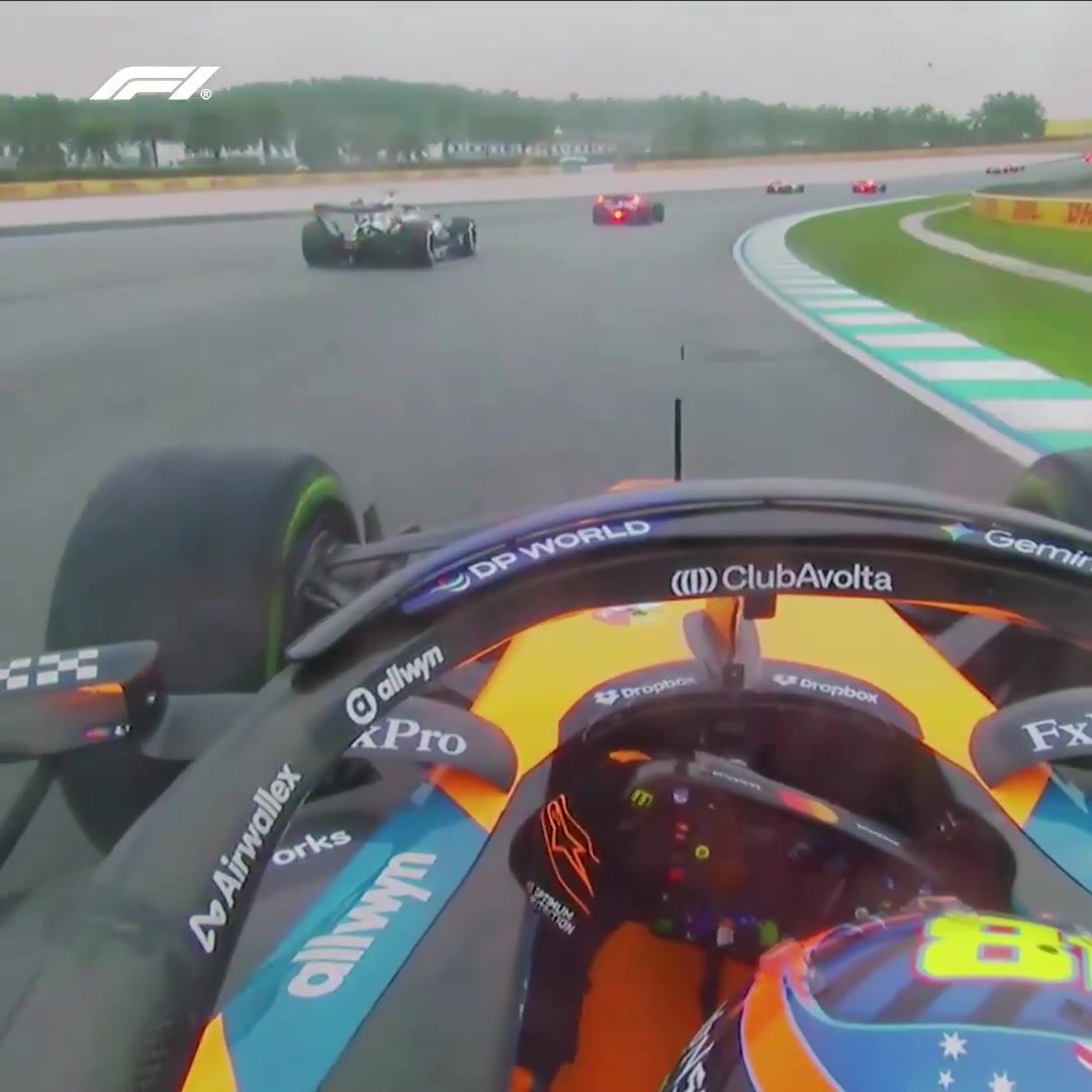 Oscar Piastri makes several moves on the Intermediate tyres on the opening lap at Sepang