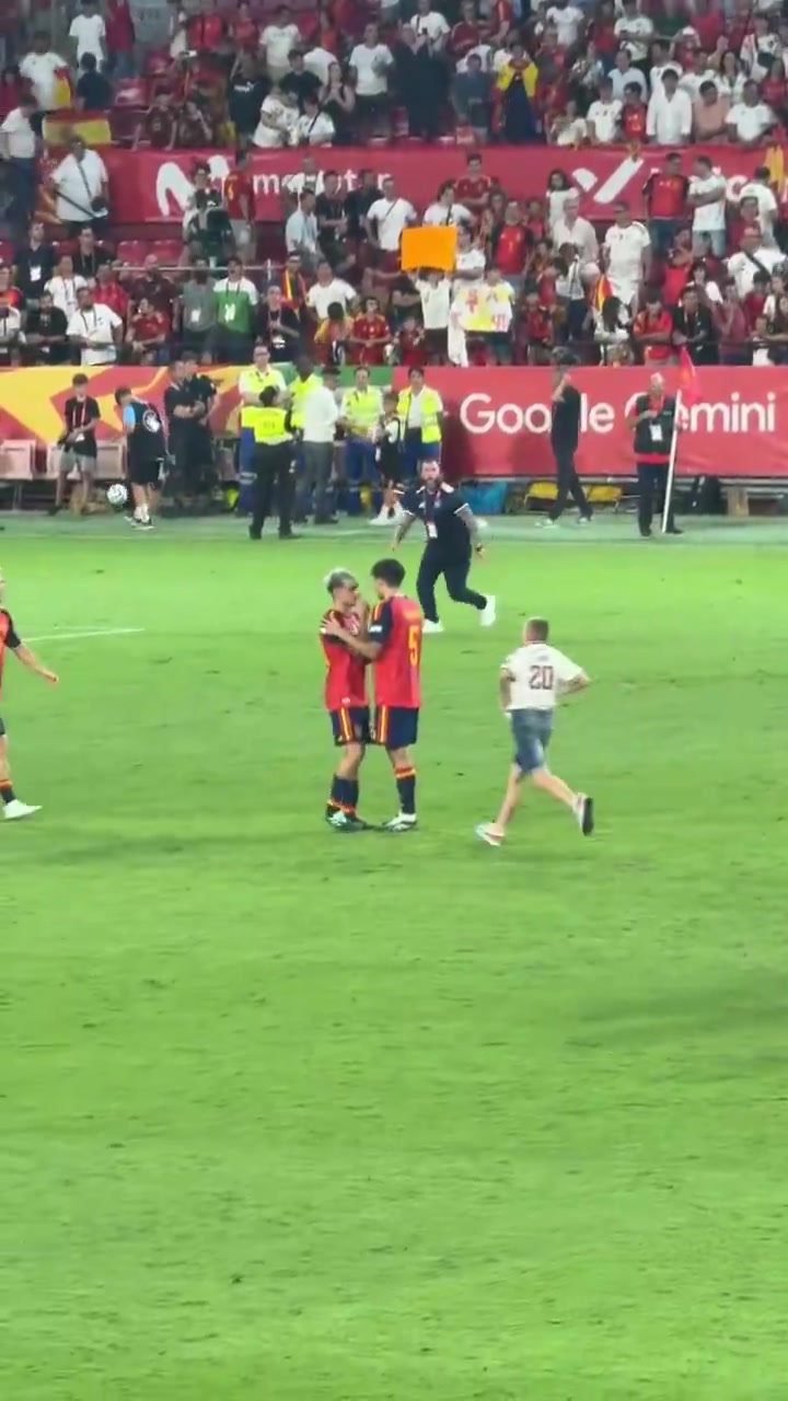 Pedri gives his shirt to a young boy who ran onto the pitch.