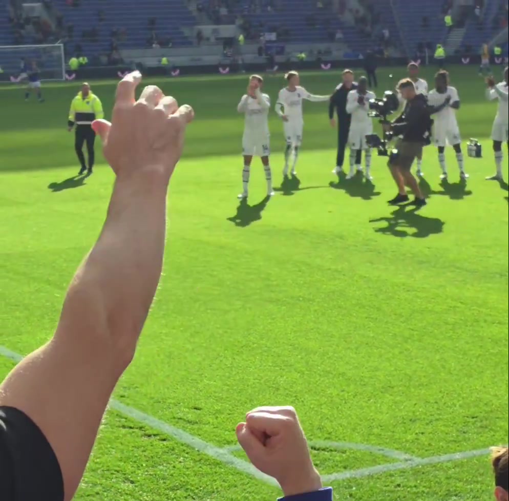 Palmer pushes Xabi towards the fans to celebrate the win against Everton.