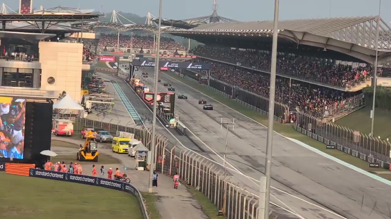 Another angle of George stopping as Norris nearly makes contact with Piastri behind the Safety Car