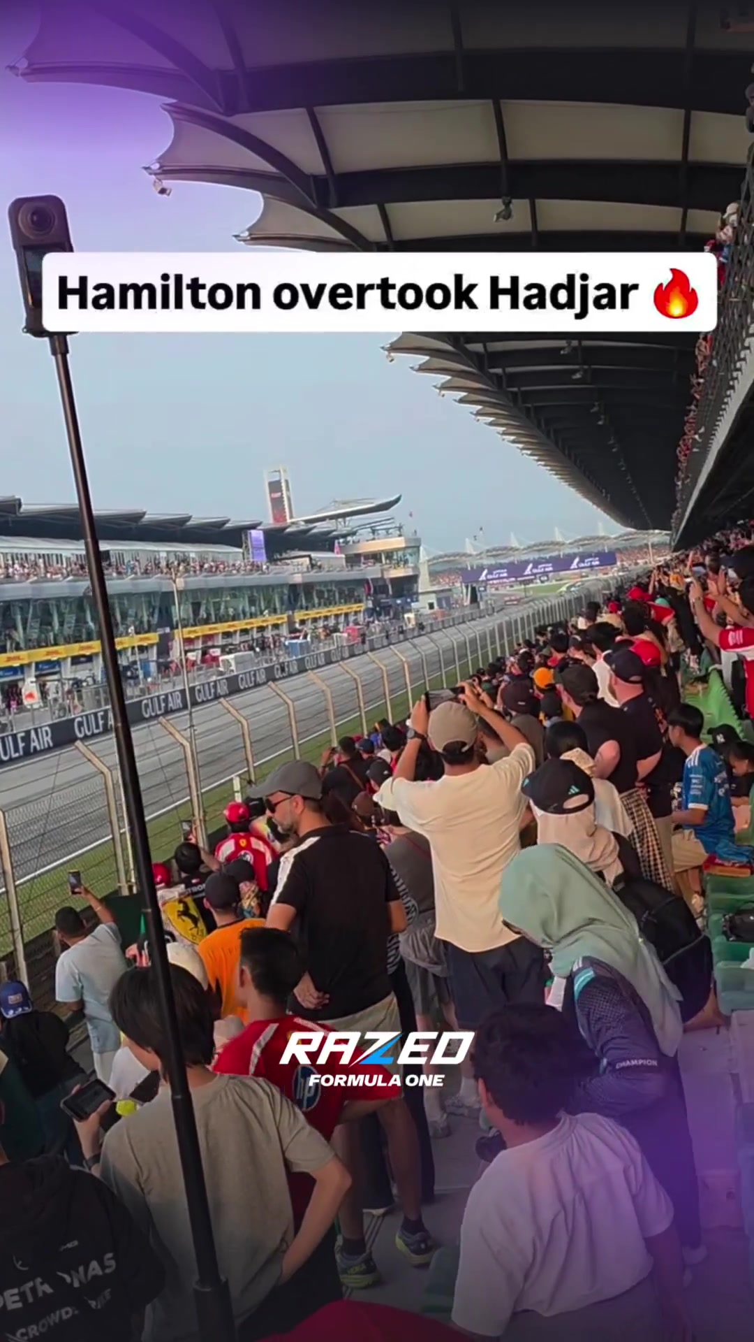 The crowd’s reaction as Lewis Hamilton overtakes Isack Hadjar