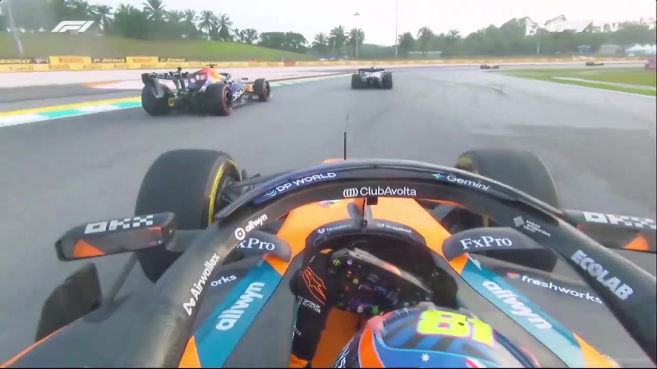 Oscar giving Max a thumbs up post race